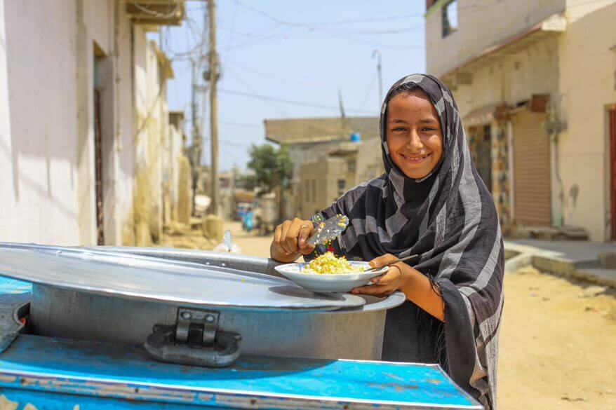 Aamna is selling roadside biryani